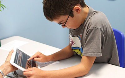 Boy with tablet Resized